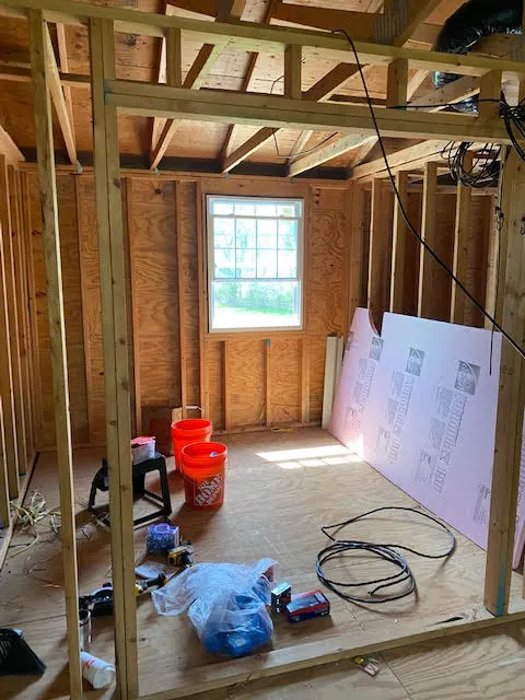 Bathroom before remodeling, original dated condition