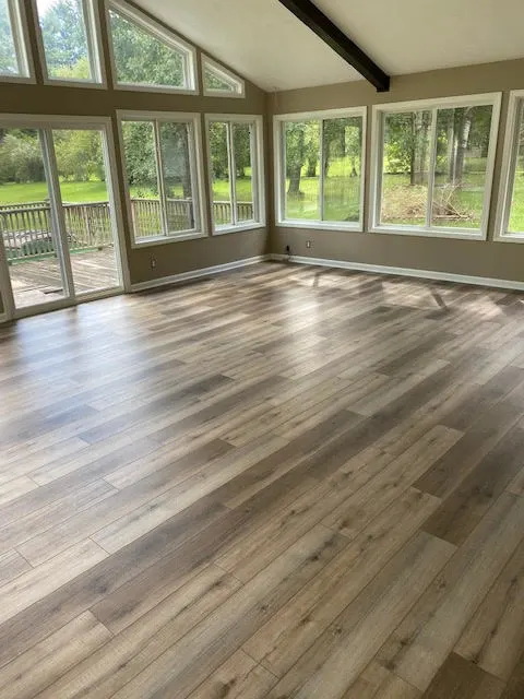 Bright living room after renovation with new flooring